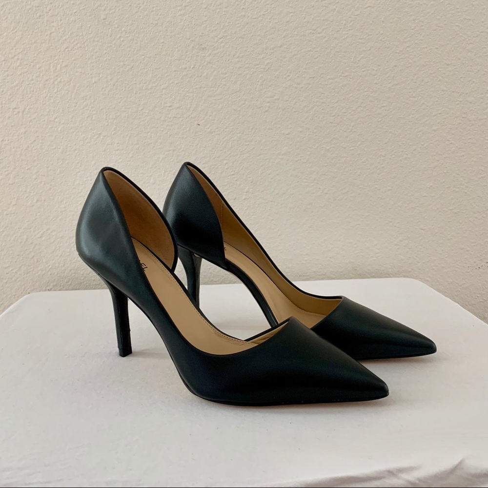 Michael Kors black heels new and never been worn.